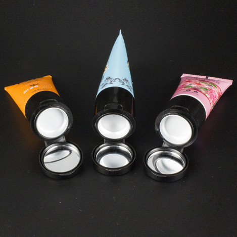 plastic cream tube with mirror