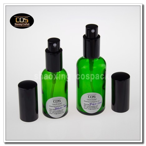 1 ounce green glass spray bottle