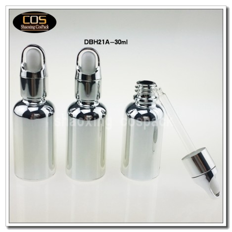 silver glass bottle with lids