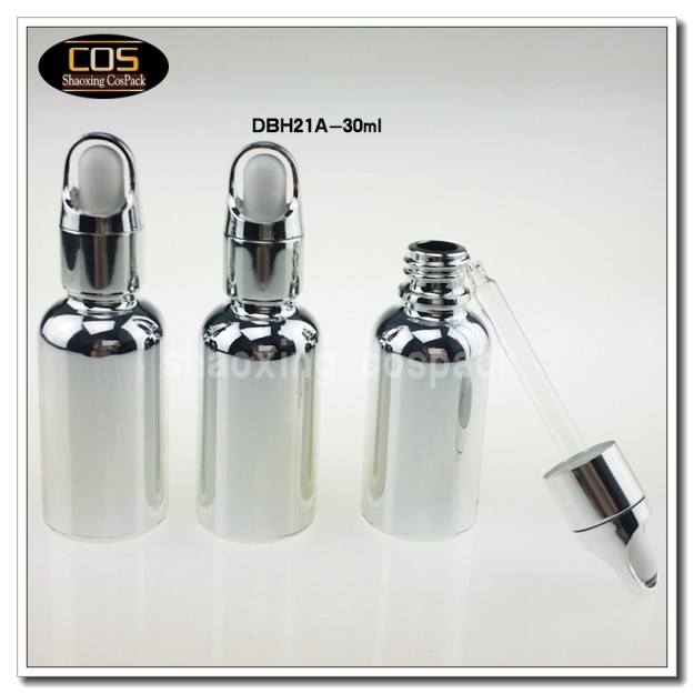 silver glass bottle with lids