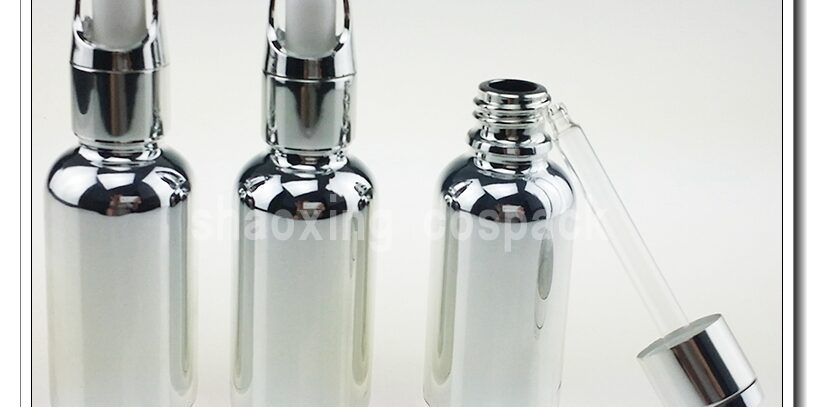 silver glass bottle with lids