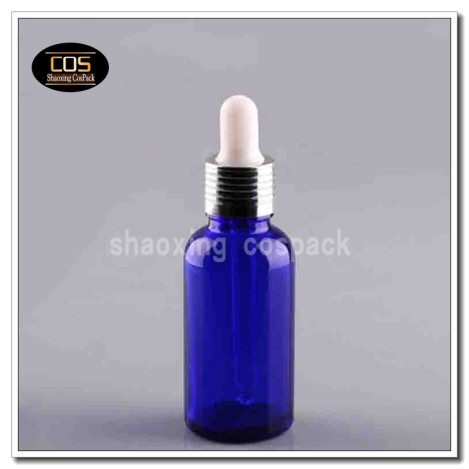 Blue Dropper bottle with shiny silver ring