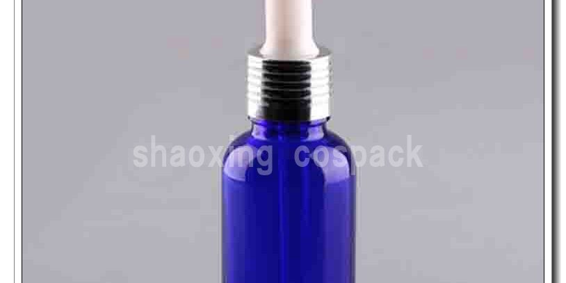 Blue Dropper bottle with shiny silver ring