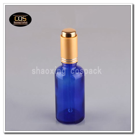 Blue glass bottle with dopper cap