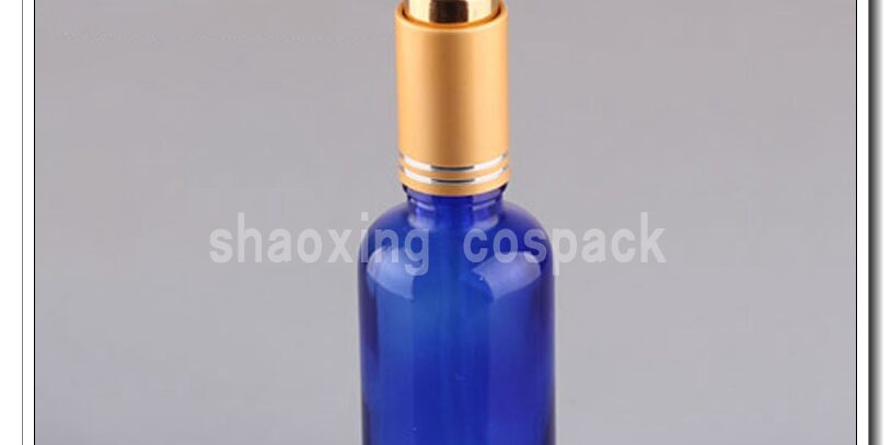 Blue glass bottle with dopper cap