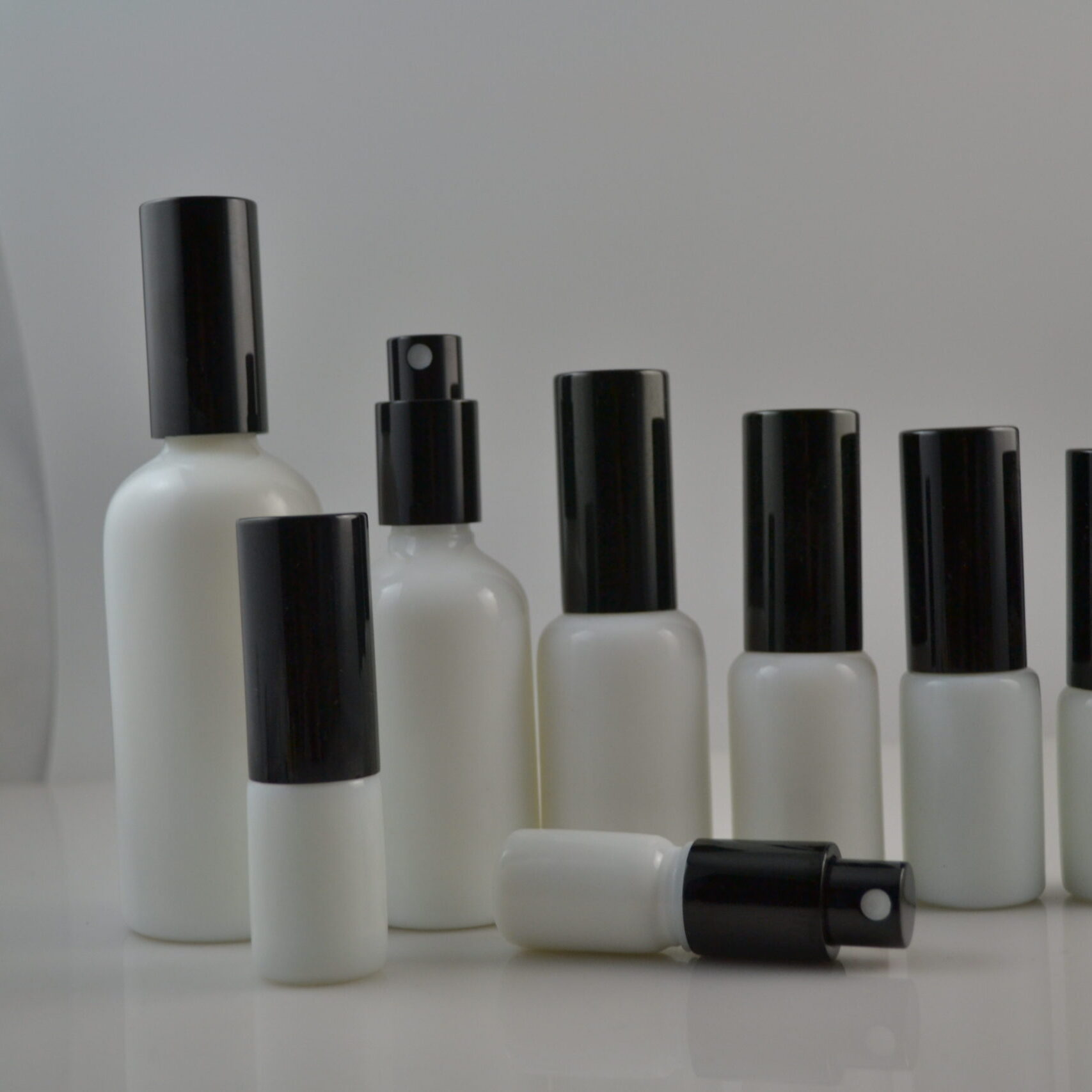 Wholesale Opal White Glass Bottles With Spray